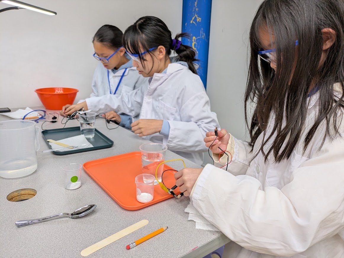 Students building and testing chemistry apparatus